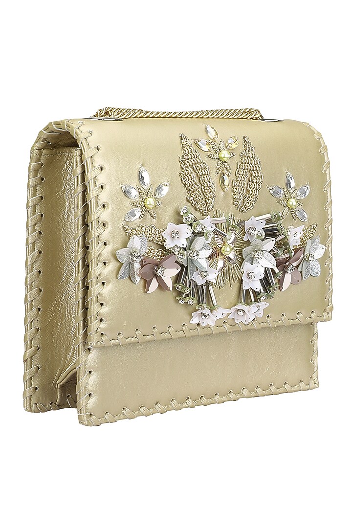 Studio Accessories presents Gold and silver floral motif clutch bag available only at Pernia's Pop Up Shop.