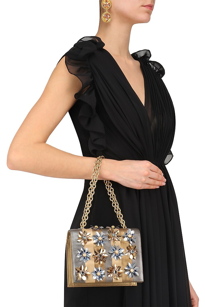 Studio Accessories presents Gold and silver stripes floral embellished clutch bag availble only at Pernia's Pop Up Shop.