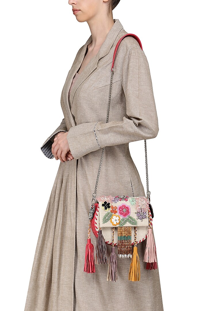 Beige beads and sequins embellished clutch available only at Pernia's Pop Up Shop.