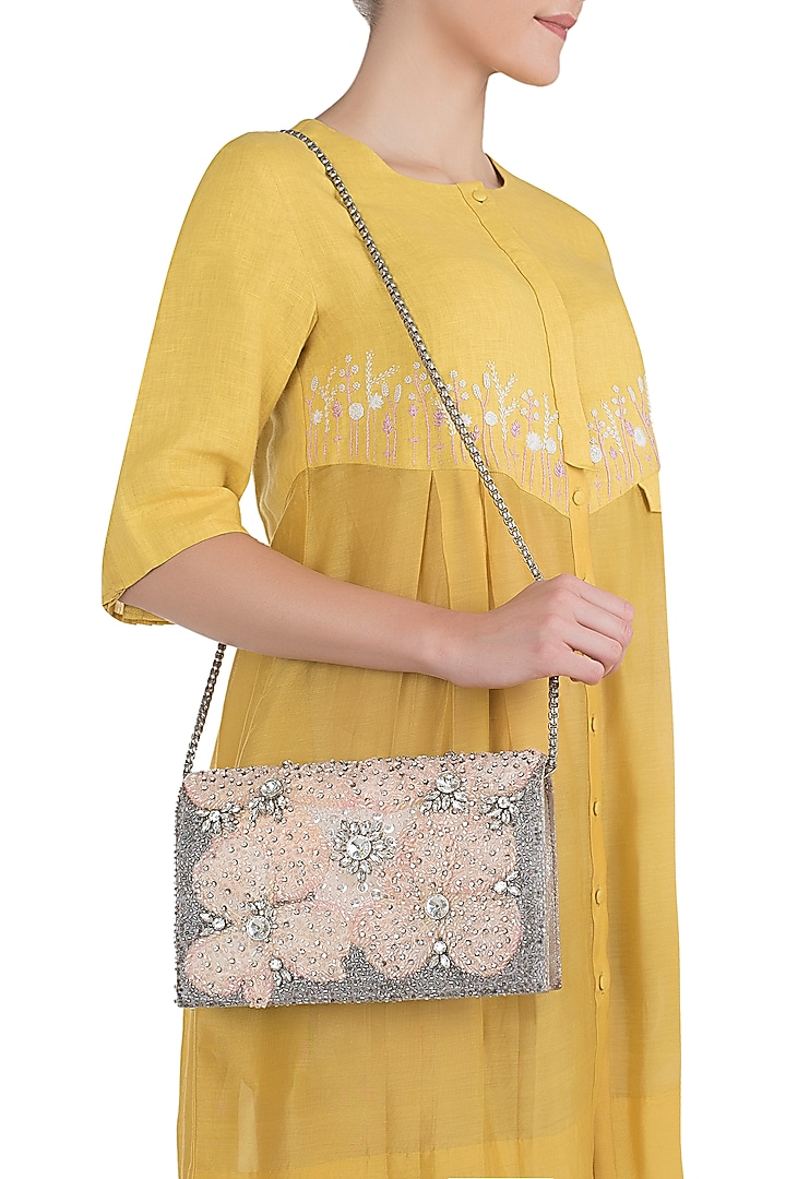 Beige floral clutch available only at Pernia's Pop Up Shop.