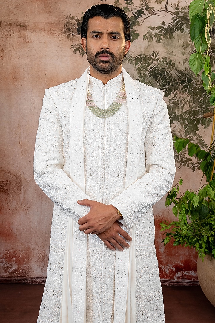 Ivory Raw Silk Thread Embroidered Groom Sherwani Set by ADANI at Pernia's Pop Up Shop