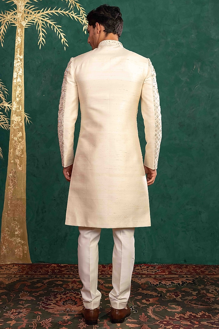 Ivory Raw Silk Resham Embroidered Groom Sherwani Set by ADANI at Pernia's Pop Up Shop