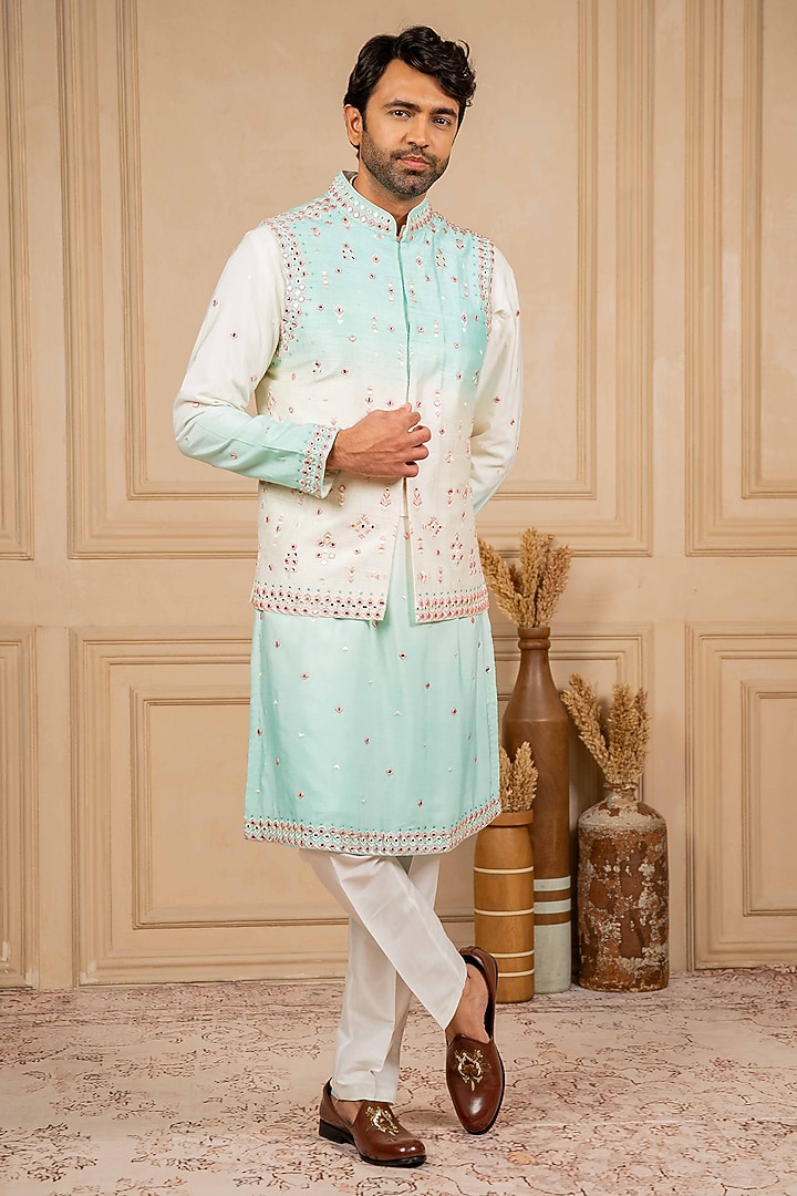 Light Blue Ombre Raw Silk Resham Embroidered Bundi Jacket Set by ADANI at Pernia's Pop Up Shop