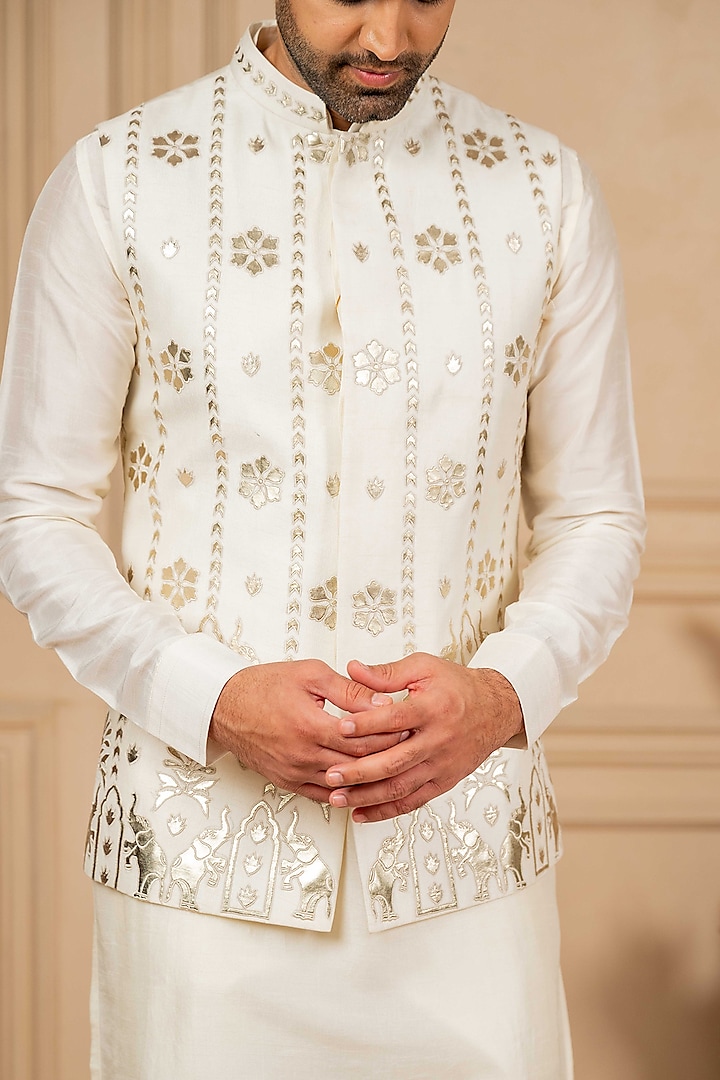 Off-White Dupion Silk Foil Applique Work Bundi Jacket Set by ADANI at Pernia's Pop Up Shop