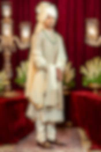 Ivory Raw Silk Resham Embroidered Groom Sherwani Set by ADANI at Pernia's Pop Up Shop