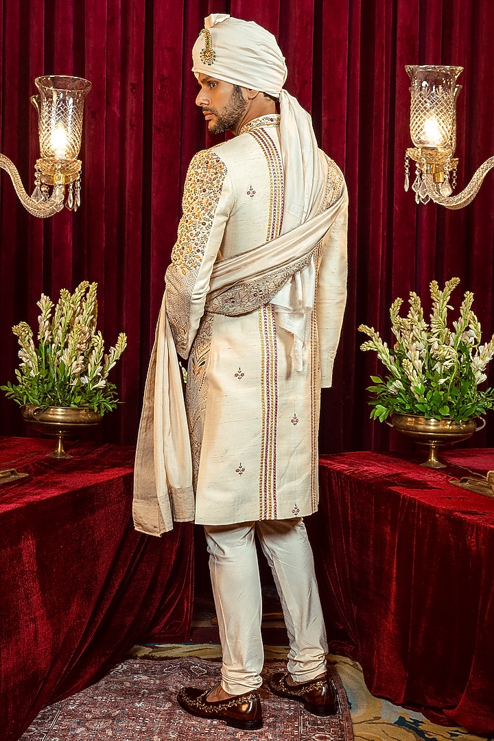 Ivory & Gold Raw Silk Resham Embroidered Groom Sherwani Set by ADANI at Pernia's Pop Up Shop