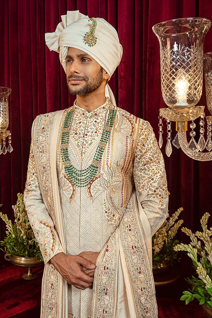 Ivory & Gold Raw Silk Resham Embroidered Groom Sherwani Set by ADANI at Pernia's Pop Up Shop