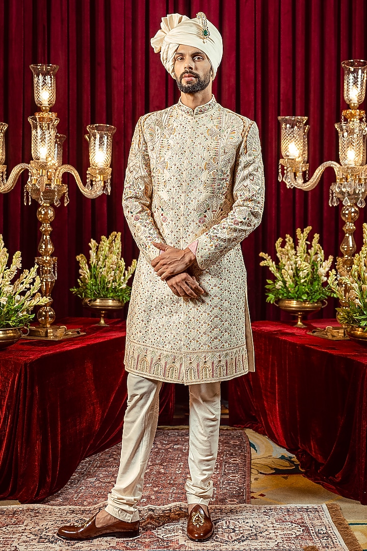 Ivory & Gold Raw Silk Resham Embroidered Groom Sherwani Set by ADANI at Pernia's Pop Up Shop