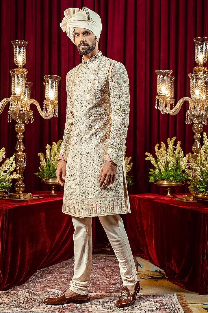 Ivory & Gold Raw Silk Resham Embroidered Groom Sherwani Set by ADANI at Pernia's Pop Up Shop