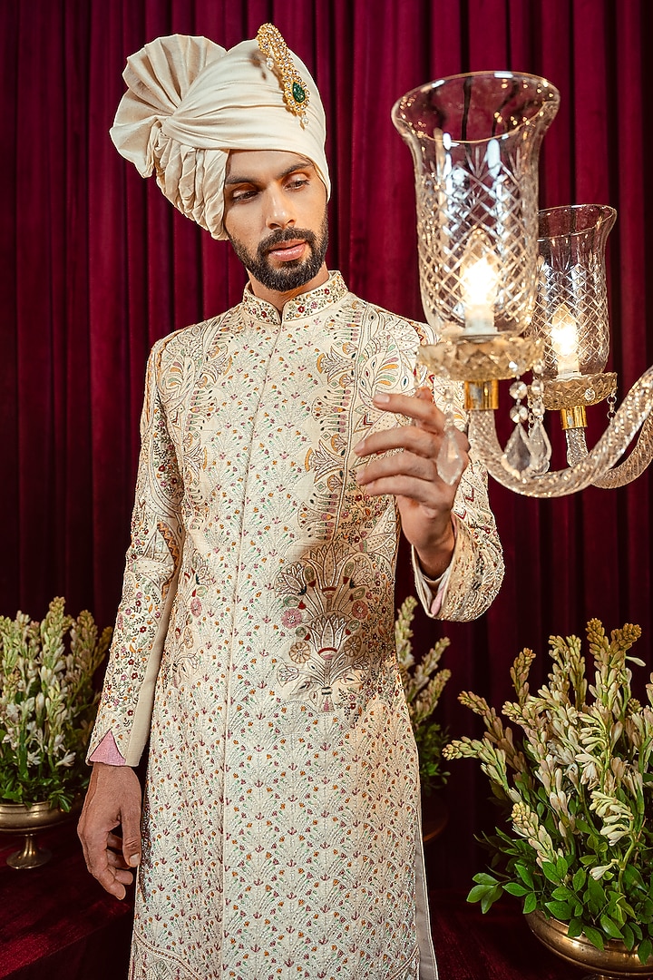 Ivory & Gold Raw Silk Resham Embroidered Groom Sherwani Set by ADANI at Pernia's Pop Up Shop