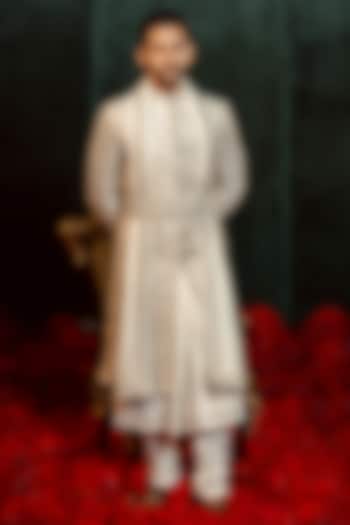 Ivory Raw Silk Dori Embroidered Wedding Sherwani Set by ADANI at Pernia's Pop Up Shop