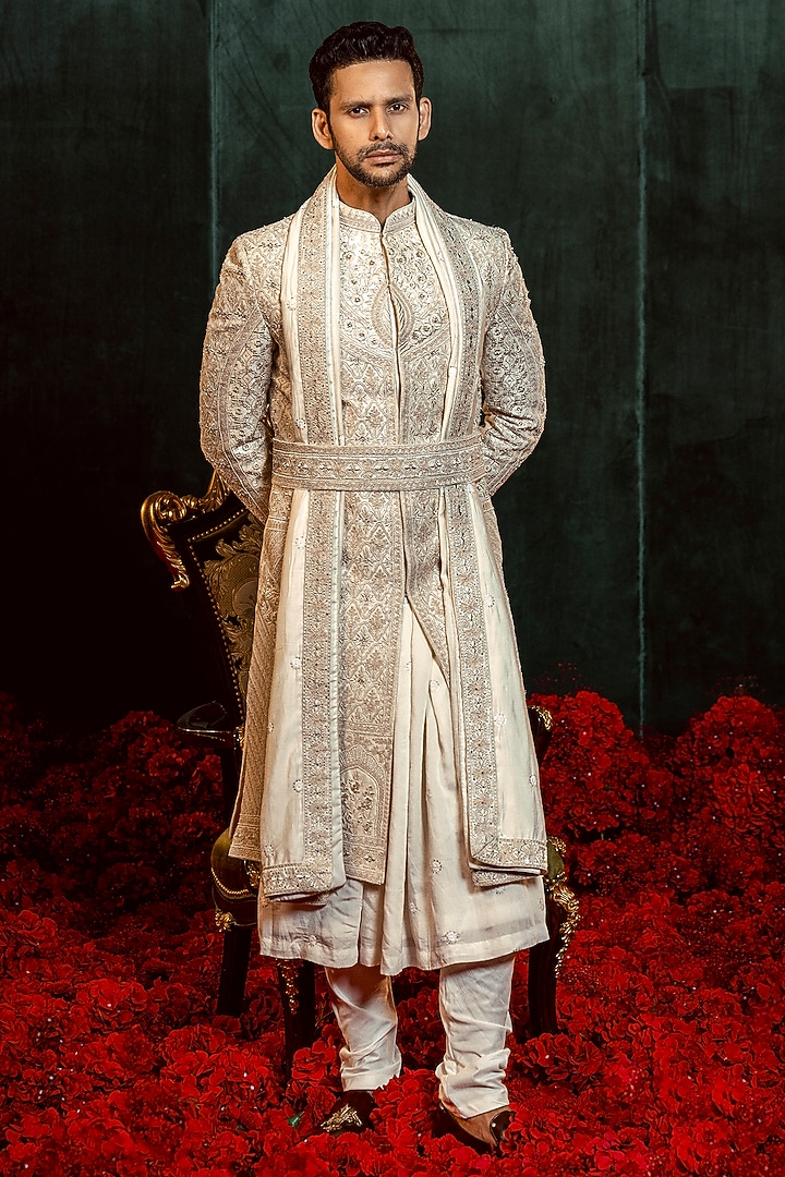 Ivory Raw Silk Dori Embroidered Wedding Sherwani Set by ADANI at Pernia's Pop Up Shop