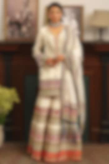 Ivory Georgette & Raw Silk Paisley Printed Bridal Sharara Set by Aditi Gupta at Pernia's Pop Up Shop