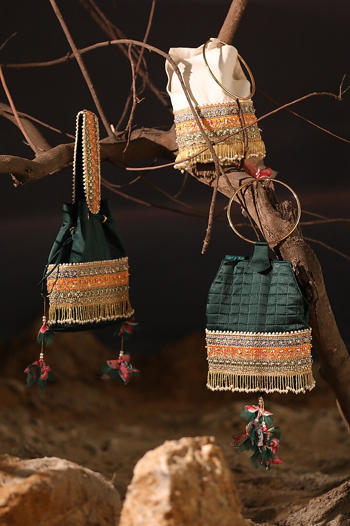 Deep Green Satin Tasseled Quilted Potli by Aditi Gupta at Pernia's Pop Up Shop