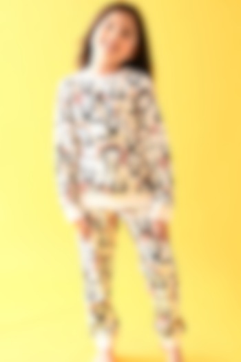 White Motif Printed Jogger Pant Set For Girls by Anthrilo at Pernia's Pop Up Shop