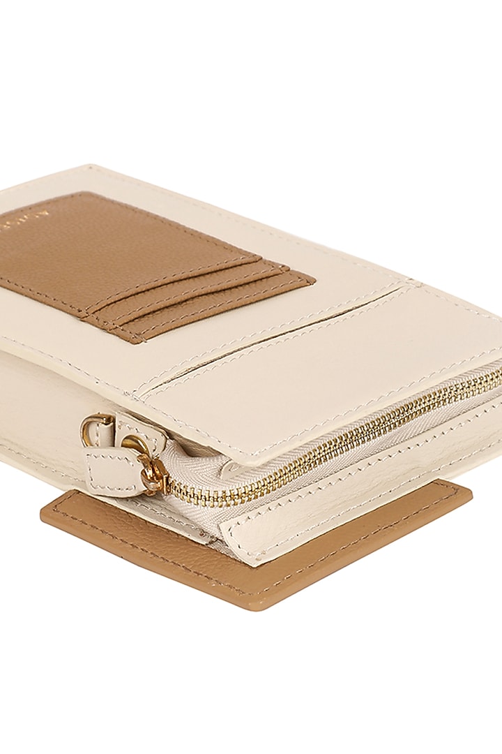 Ivory Leather Phone Bag by ADISEE at Pernia's Pop Up Shop