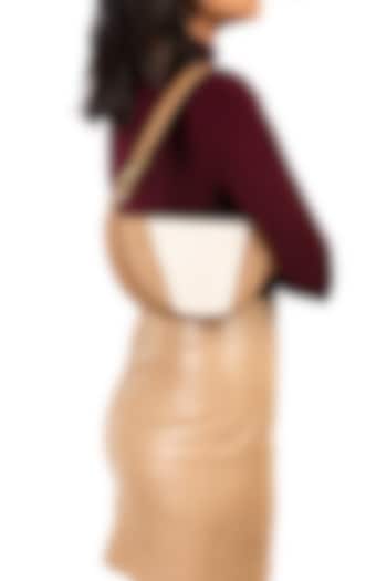 Beige & Cream Leather Handcrafted Semi-Circular Baguette Bag by ADISEE at Pernia's Pop Up Shop