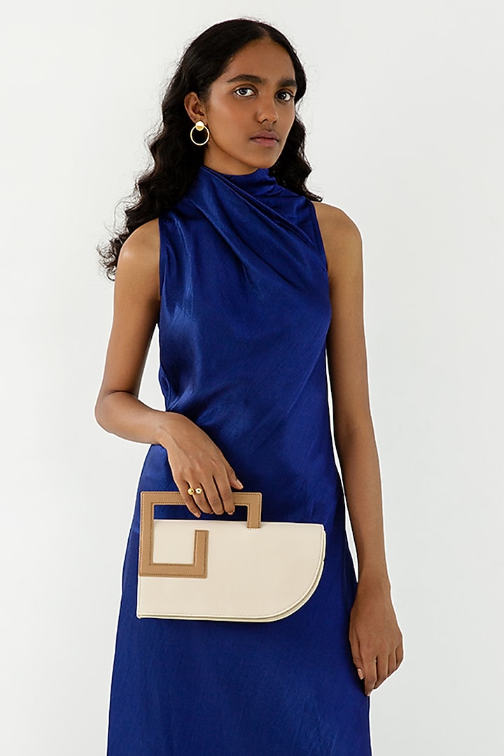 Ivory Leather Structured Clutch Bag by ADISEE at Pernia's Pop Up Shop