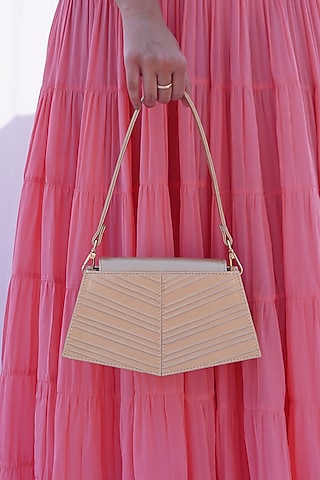 Gold Faux Leather Corded Hand Bag by ADISEE