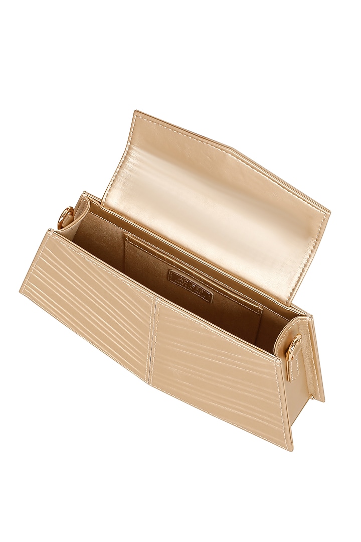 Gold Faux Leather Corded Hand Bag by ADISEE at Pernia's Pop Up Shop