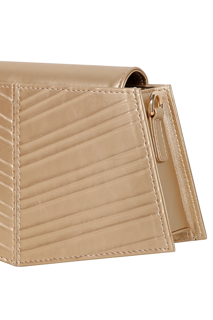 Gold Faux Leather Corded Hand Bag by ADISEE at Pernia's Pop Up Shop