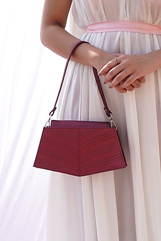 Red Faux Leather Corded Hand Bag by ADISEE