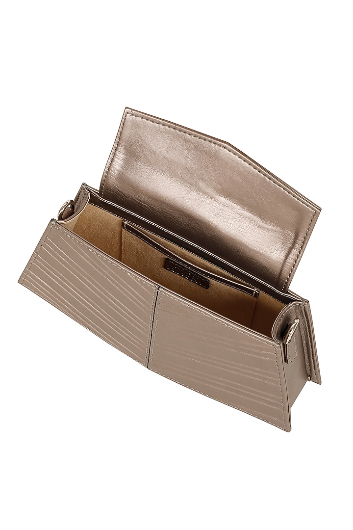 Gunmetal Faux Leather Corded Hand Bag by ADISEE at Pernia's Pop Up Shop