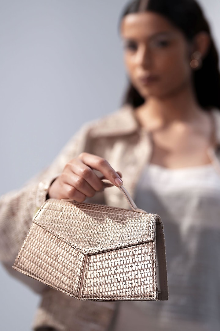 Gold Handwoven Textile & Leather Hand Bag by ADISEE at Pernia's Pop Up Shop