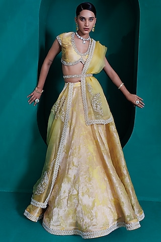 Yellow Jacquard Zari Organza Lehenga Set by ADI BY ADITYA KHANDELWL