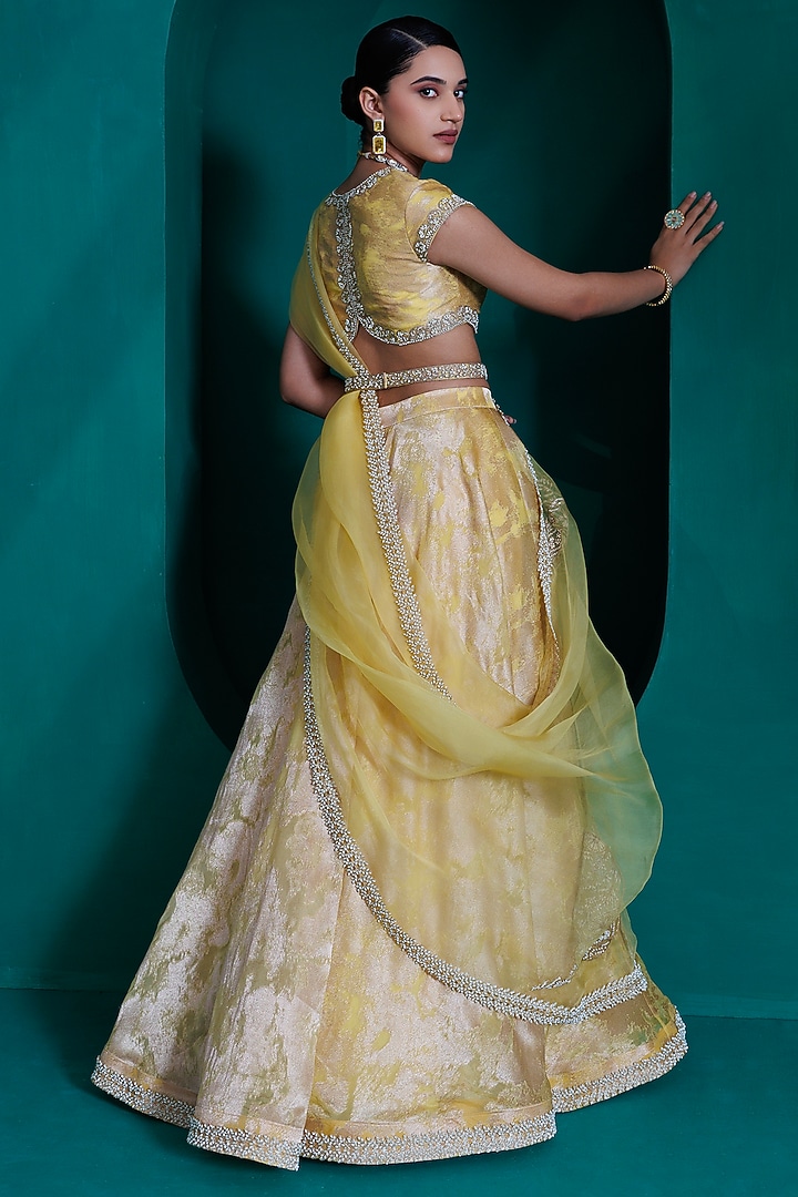 Yellow Jacquard Zari Organza Wedding Lehenga Set by ADI BY ADITYA KHANDELWL at Pernia's Pop Up Shop