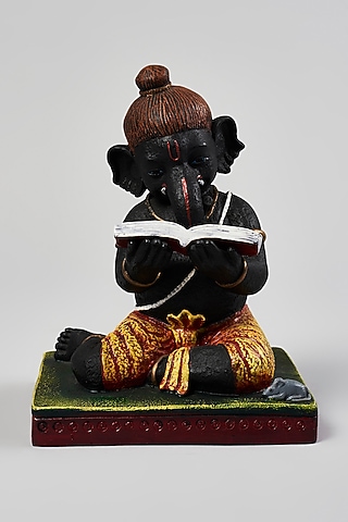 Black & Golden Fibre Study Ganpati With Book Showpiece by Home Decor by Aditi