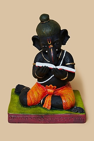 Multi-Colored Fibre Ganpati With Book by Home Decor by Aditi