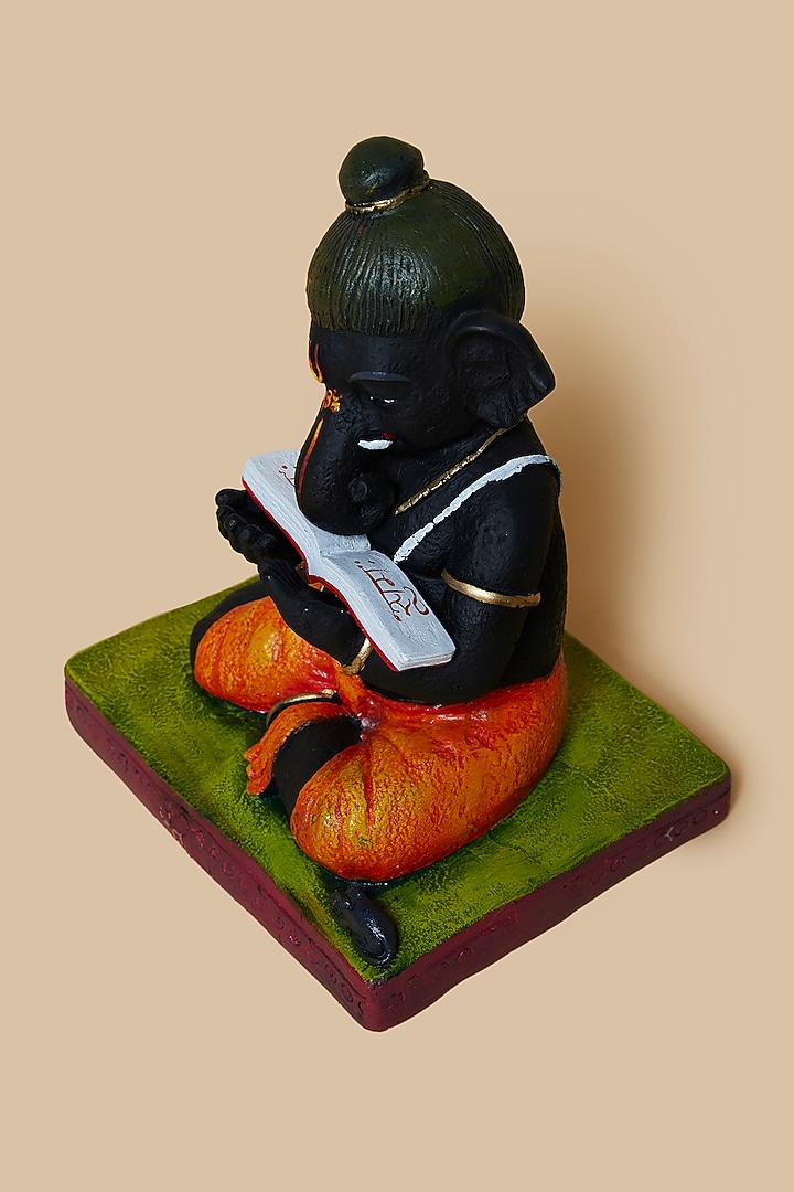 Multi-Colored Fibre Ganpati With Book by Home Decor by Aditi at Pernia's Pop Up Shop