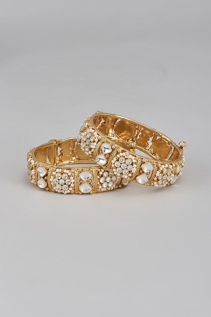 Gold Finish Kundan Polki Bangles (Set of 2) by Adityam Jewels at Pernia's Pop Up Shop