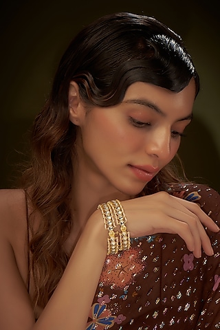 Gold Finish Kundan Polki Bangles (Set of 2) by Adityam Jewels