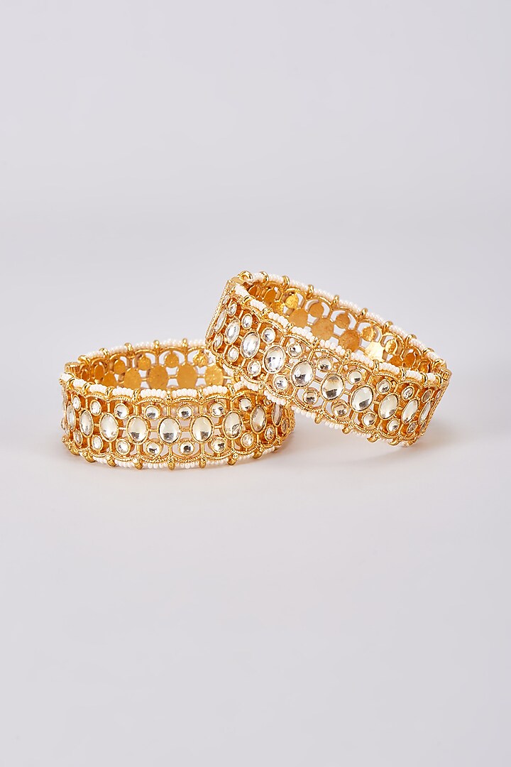 Gold Finish White Kundan Polki Bangles (Set Of 2) by Adityam Jewels at Pernia's Pop Up Shop