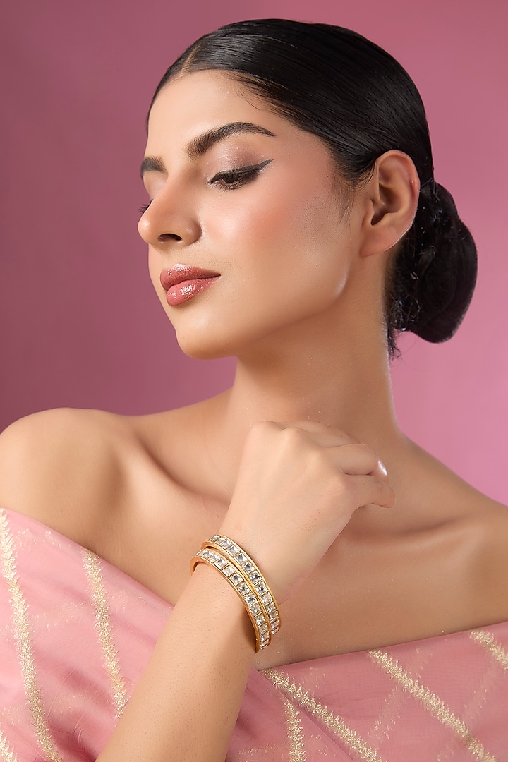 Gold Finish Kundan Polki Bangles (Set Of 2) by Adityam Jewels at Pernia's Pop Up Shop