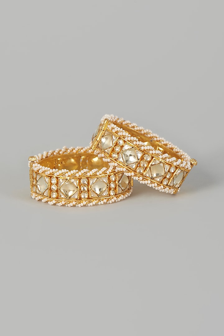 Gold Finish Kundan Polki Bangles (Set of 2) by Adityam Jewels at Pernia's Pop Up Shop