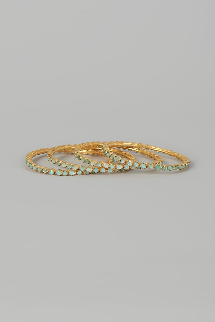 Gold Finish Bangles With Kundan Polki (Set of 4) by Adityam Jewels at Pernia's Pop Up Shop