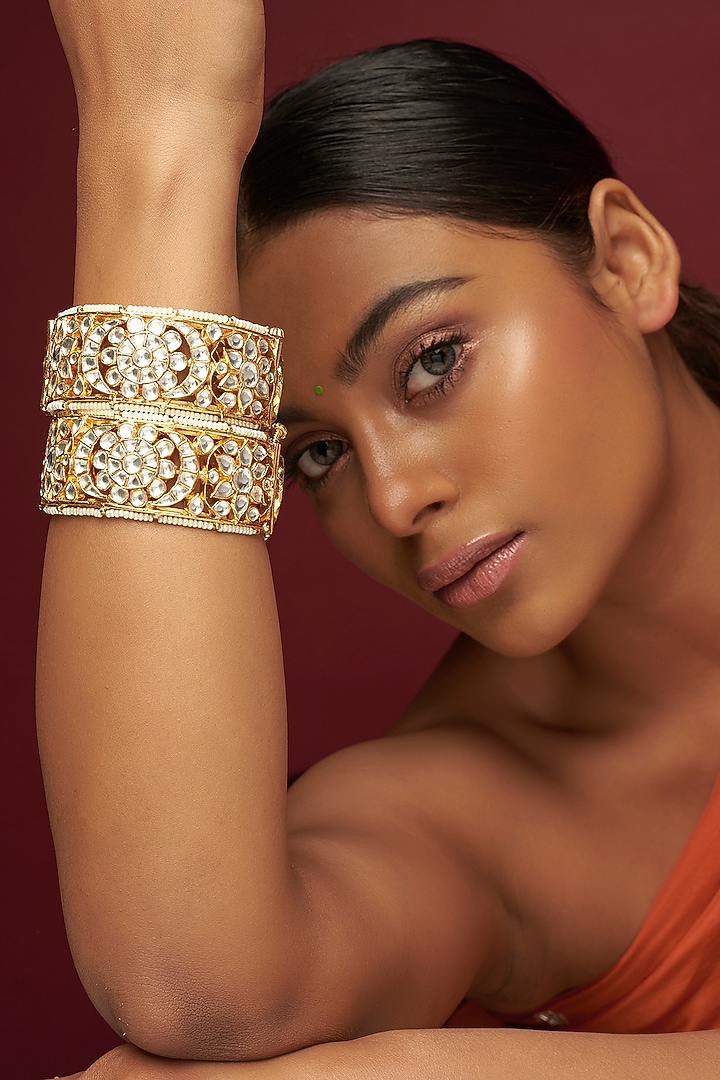 Gold Finish Kundan Polki Bangles (Set of 2) by Adityam Jewels at Pernia's Pop Up Shop