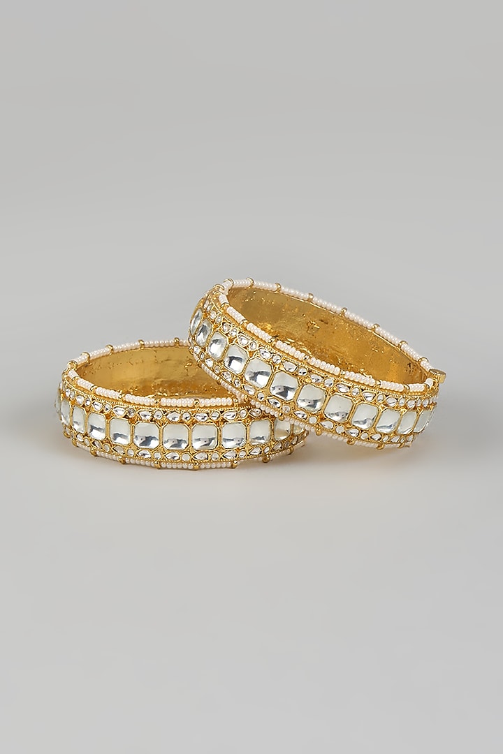Gold Finish Kundan Polki Bangles (Set Of 2) by Adityam Jewels at Pernia's Pop Up Shop