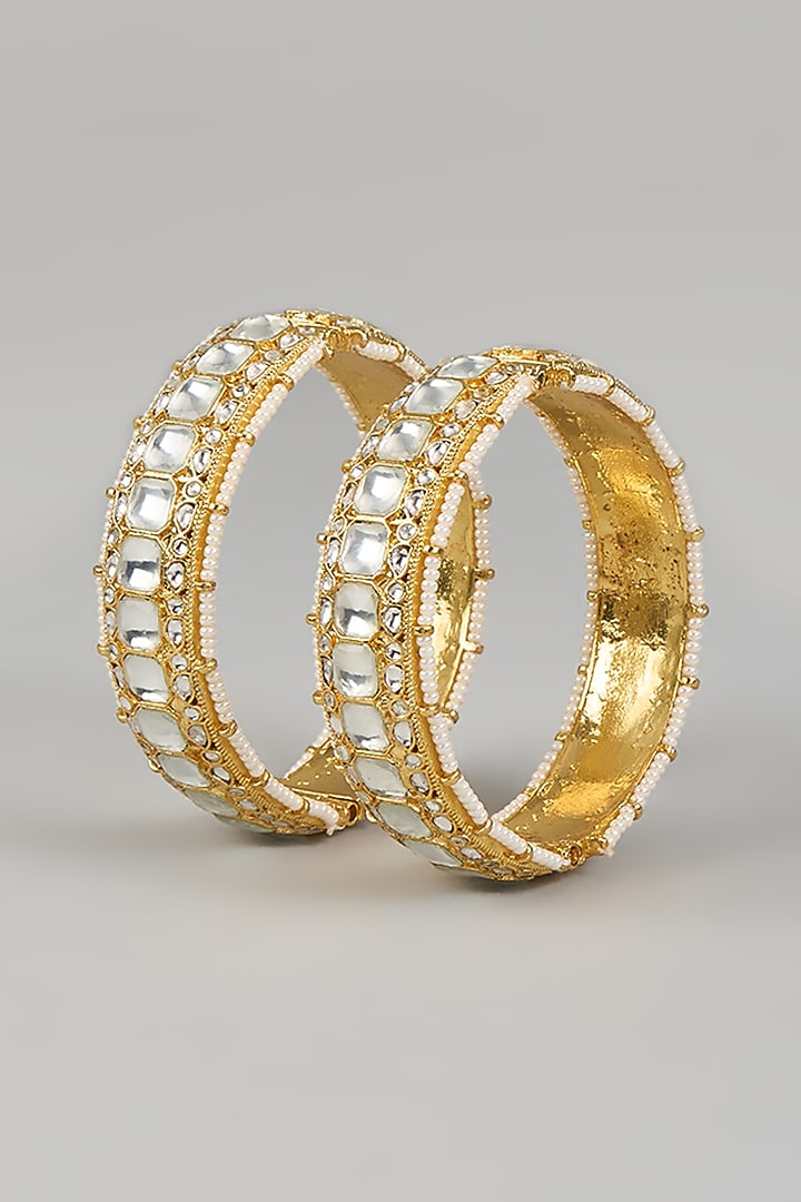 Gold Finish Kundan Polki Bangles (Set Of 2) by Adityam Jewels at Pernia's Pop Up Shop