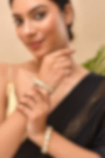 Gold Finish Kundan Polki Bangle (Set Of 2) by Adityam Jewels at Pernia's Pop Up Shop