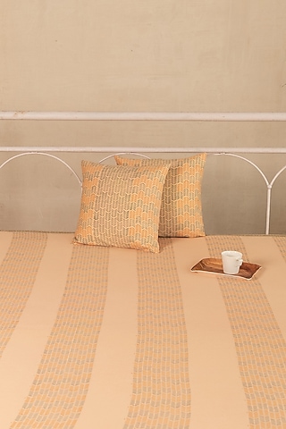 Peach Cotton Satin Geometric Printed Bedcover (Set Of 3) by ADYA
