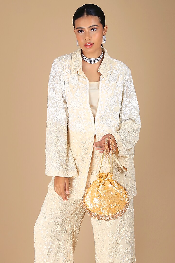 Gold Poly Silk Sequins Embroidered Potli Bag by Adora by Ankita at Pernia's Pop Up Shop