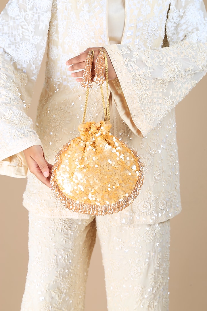 Gold Poly Silk Sequins Embroidered Potli Bag by Adora by Ankita at Pernia's Pop Up Shop