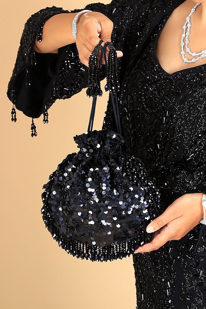 Black Poly Silk Sequins Embroidered Potli Bag by Adora by Ankita at Pernia's Pop Up Shop