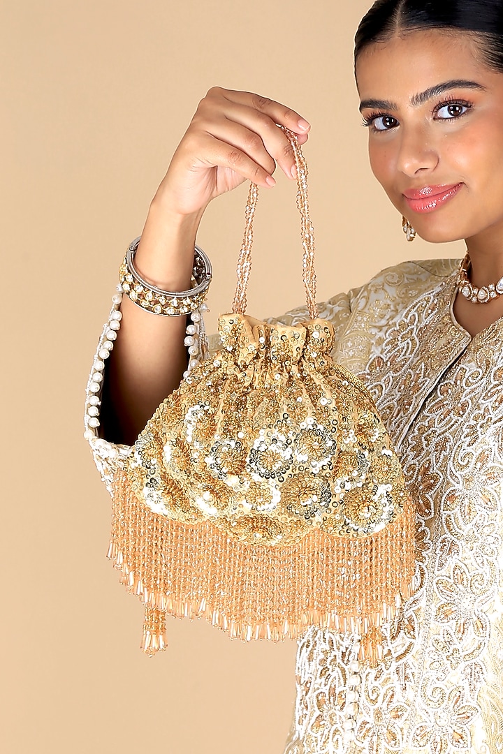 Gold Poly Silk Sequins Embroidered Potli Bag by Adora by Ankita at Pernia's Pop Up Shop