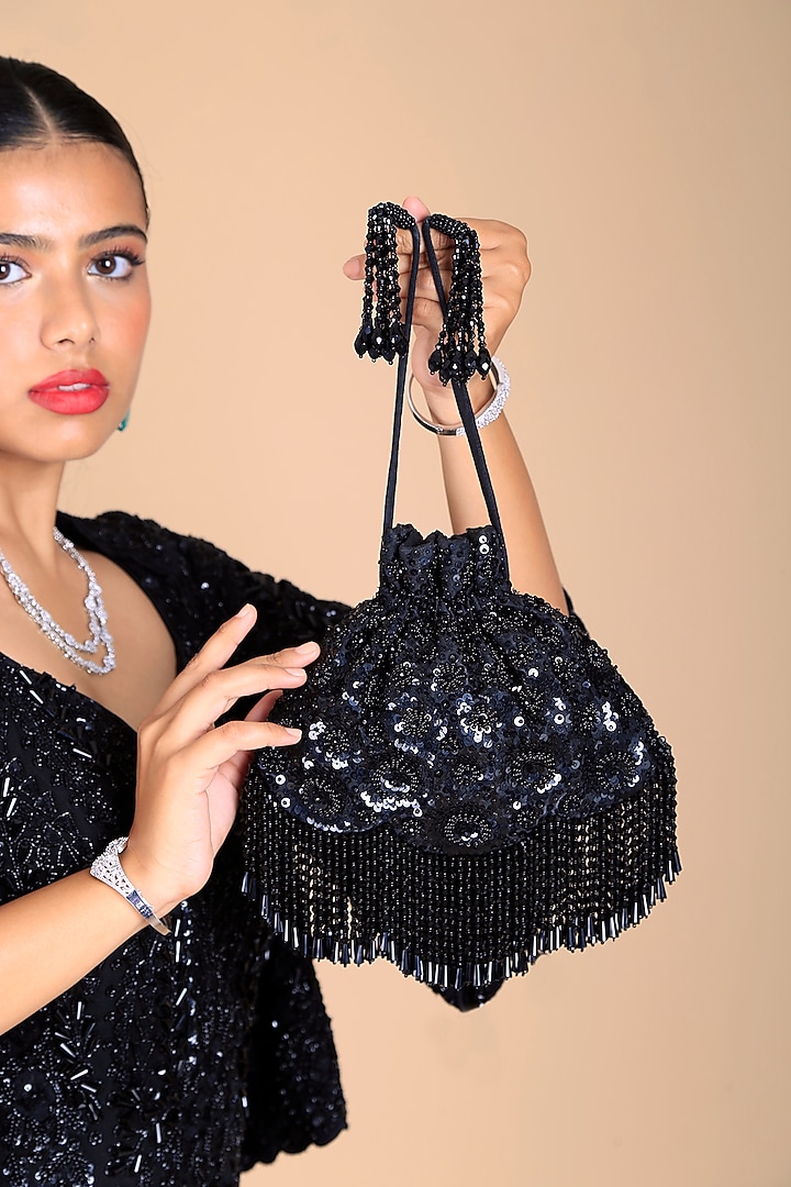 Black Poly Silk Sequins Embroidered Potli Bag by Adora by Ankita at Pernia's Pop Up Shop