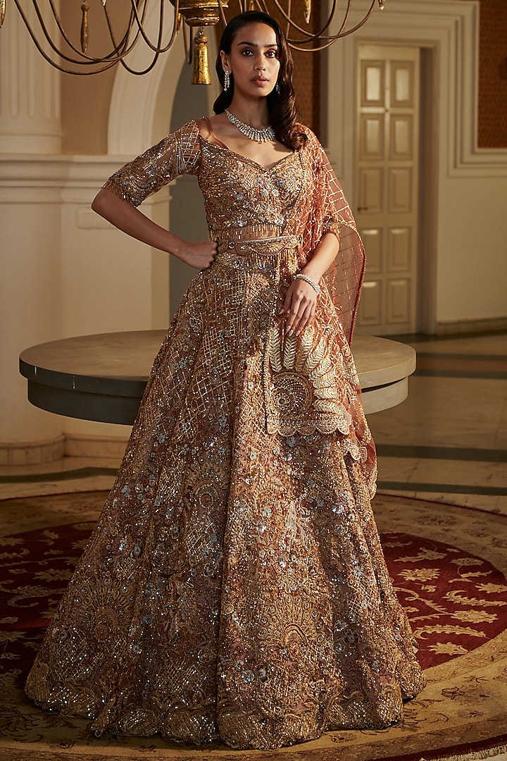 Rust Silk & Net Embroidered Lehenga Set by Adaara Couture